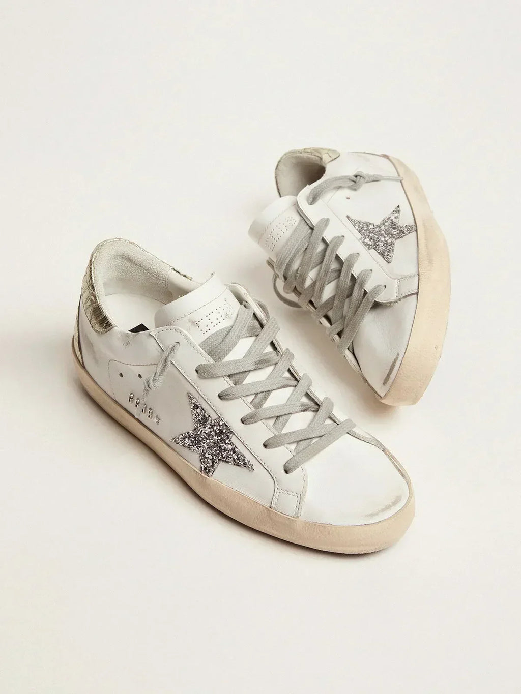Super-Star sneakers with silver glitter star and glossy gold leather heel tab