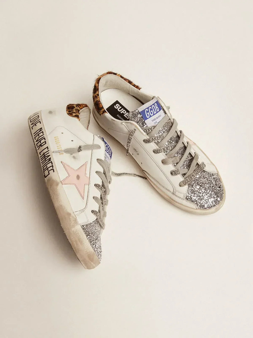Super-Star sneakers with silver glitter tongue and handwritten lettering on the foxing