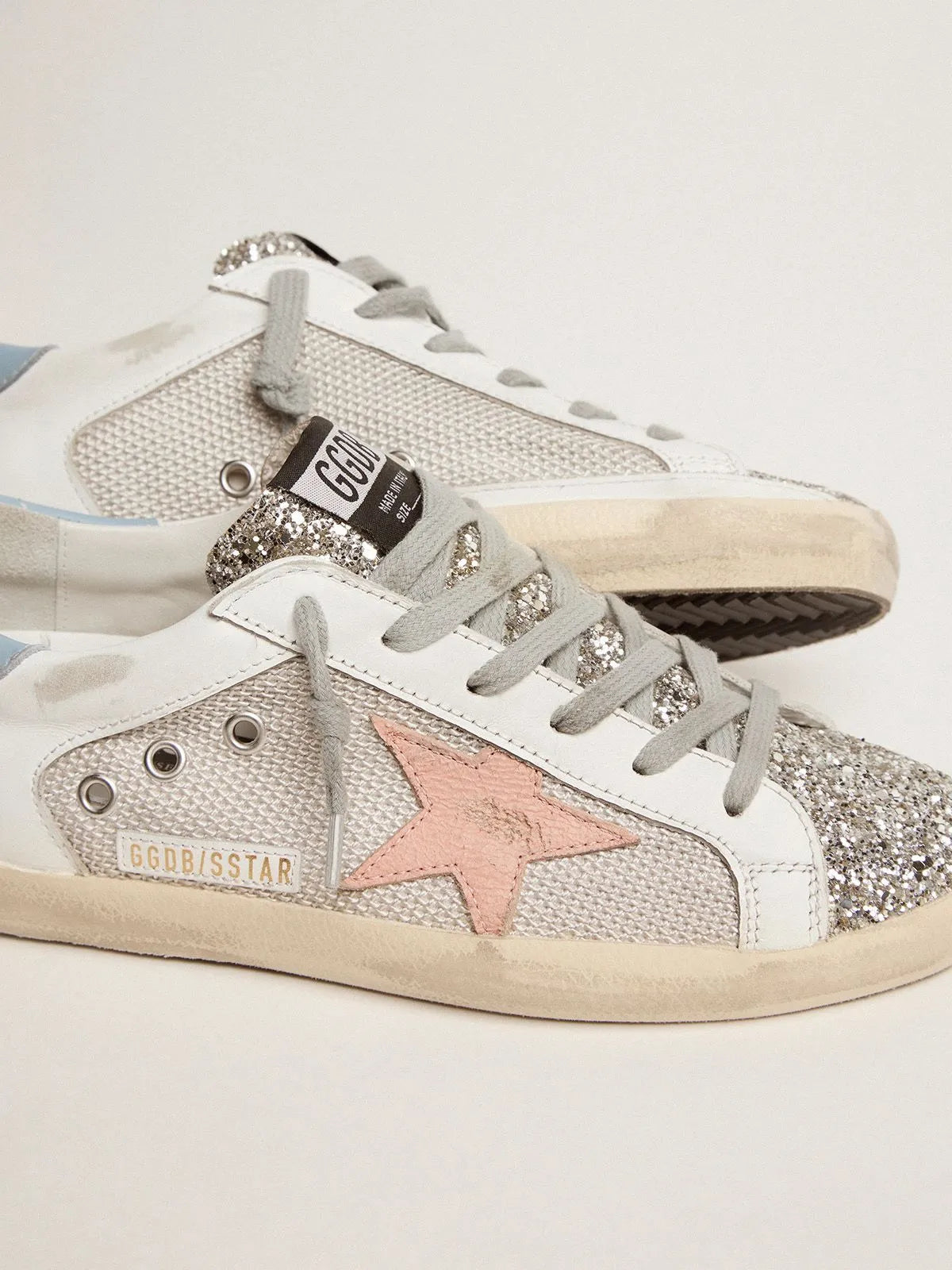 Super-Star LTD sneakers in white leather with mesh insert and silver glitter tongue