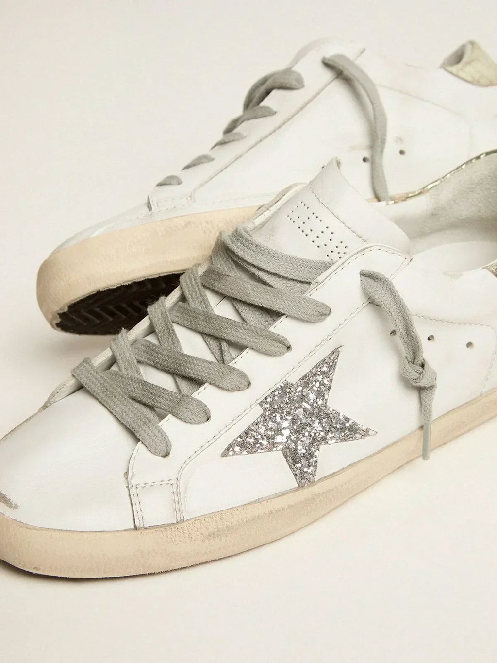 Super-Star sneakers with silver glitter star and glossy gold leather heel tab
