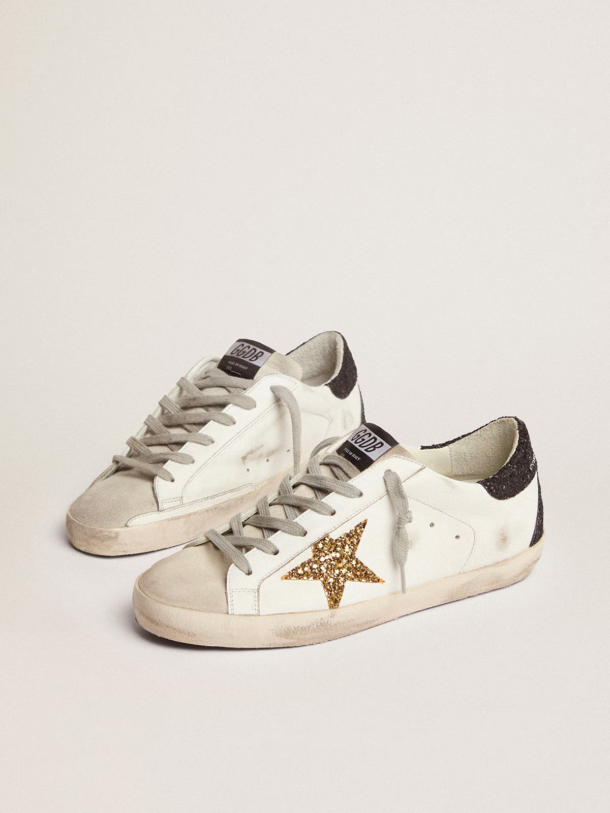 Women's Super-Star LTD with gold star and black glitter heel tab